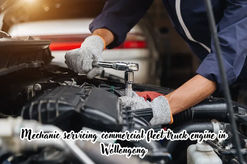 mechanic servicing commercial fleet truck engine in wollongong
